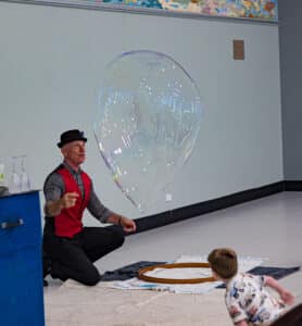 Having fun at Glen Rhodes' The Amazing Bubble Show (image credit: Creative Futures Photography)